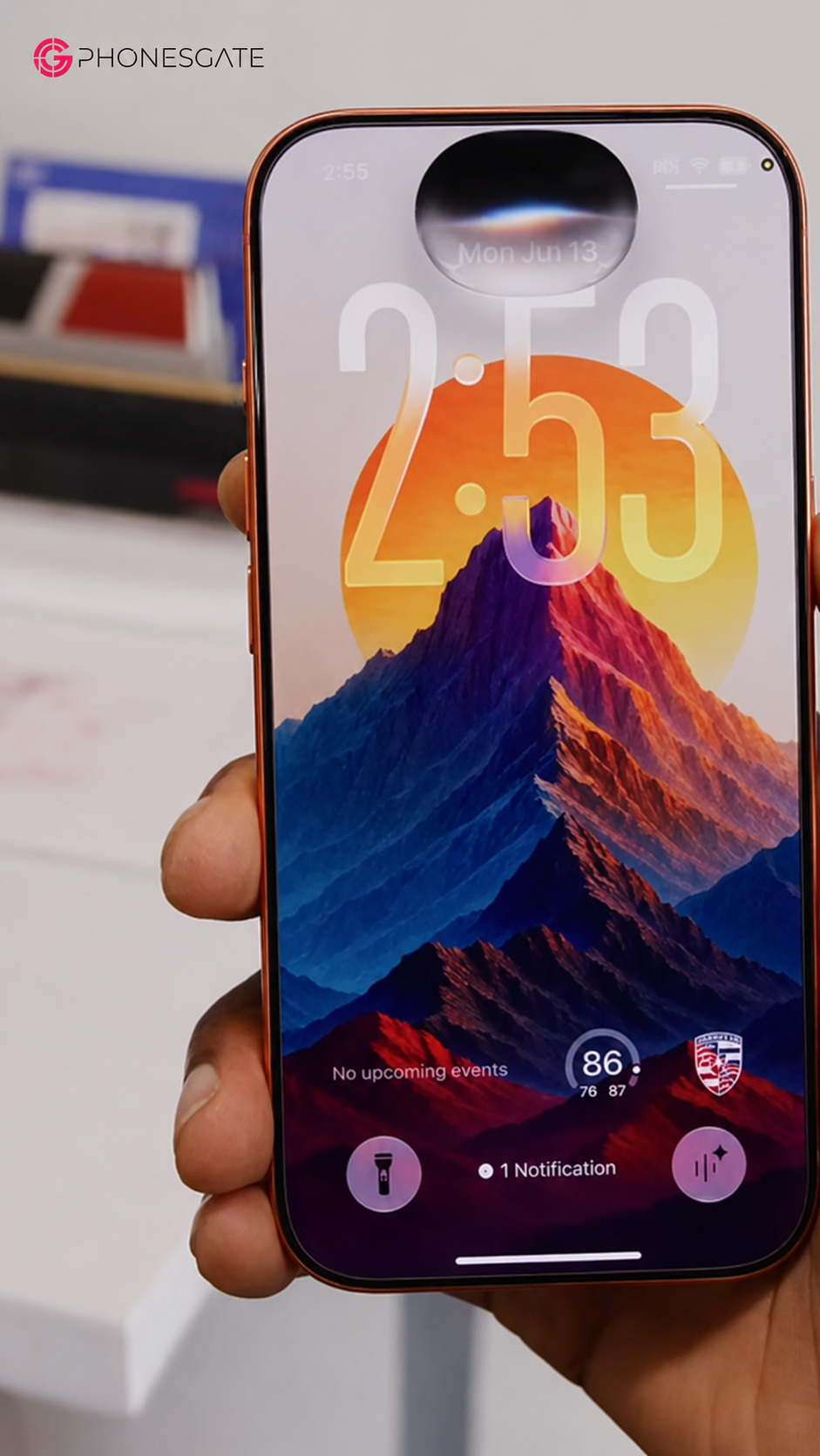 iPhone showing a redesigned Siri AI overlay around the Dynamic Island