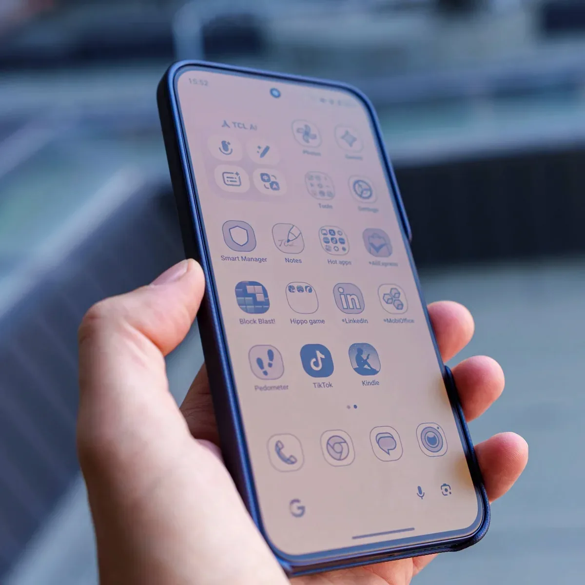PhonesGate studio photo of the TCL P80 Ultra display in hand